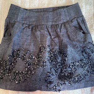 Adorable denim skirt with embellishments!